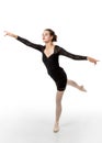 Young ballet dancer in arabesque pose