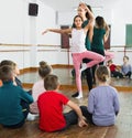 Young ballet dancers exercising in ballroom Royalty Free Stock Photo