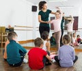 Young ballet dancers exercising in ballroom Royalty Free Stock Photo