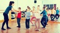 Young ballet dancers exercising in ballroom Royalty Free Stock Photo