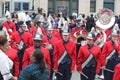 Young band members in a marching band in the Cherry Blossom Festival in Macon, GA