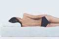 Young Bare Woman Lying on Orthopedic Mattress Royalty Free Stock Photo