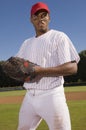 Young Baseball Pitcher Standing On Field