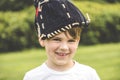 Young baseball play with glove on the head