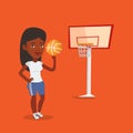 Young basketball player spinning ball.
