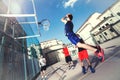 Young basketball players playing with energy in a urban place Royalty Free Stock Photo