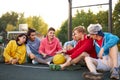 Young basketball players take a break Royalty Free Stock Photo