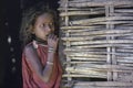 Young Bastar tribal Girl at her straw hut Kondagaon Chhattisgarh
