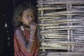 Young Bastar tribal Girl at her straw hut Kondagaon Chhattisgarh