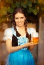 Young Bavarian Woman Holding Beer Tankard Royalty Free Stock Photo