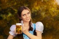 Young Bavarian Woman Holding Beer Tankard Royalty Free Stock Photo