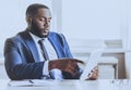 Young Beard Afro-american Man Working with Laptop. Royalty Free Stock Photo