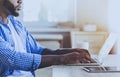 Young Beard Afro-american Man Working with Laptop. Royalty Free Stock Photo