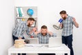 Businessman working with multiple clones of himself at the office Royalty Free Stock Photo