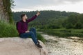 Young bearded male hipster traveler doing selfie. Adventure, vacation, tourism, internet, technology concept Royalty Free Stock Photo