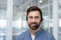 Smiling customer service man wearing headset in office Royalty Free Stock Photo