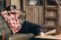 Young bearded man enjoying virtual reality glasses