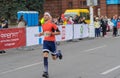 Young bearded man hurrying to finish line during `Dnepr Eco Marathon` race