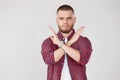 Young bearded man making stop gesture hand Royalty Free Stock Photo