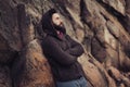 Young bearded man portrait. Sad elegant metrosexual male posing alone outdoor wearing knitted sweater. Royalty Free Stock Photo