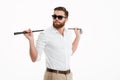 Young bearded man standing over white wall Royalty Free Stock Photo