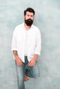 Young bearded model in urban context. handsome attractive hipster. Fashion male model. Mature hipster with beard. brutal Royalty Free Stock Photo