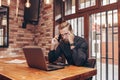 Bearded sad businessman talking on cell phone Royalty Free Stock Photo