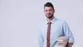 young bearded teacher in eyeglasses holding