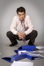 Young beaten up caucasian businessman - failure concept Royalty Free Stock Photo