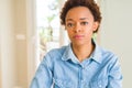 Young beautiful african american woman with serious expression on face Royalty Free Stock Photo