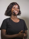 Young beautiful afro American woman coaching at seminar - happy and successful black businesswoman with headset speaking giving Royalty Free Stock Photo