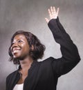 Young beautiful afro American woman coaching at seminar - happy and successful black businesswoman with headset speaking giving Royalty Free Stock Photo