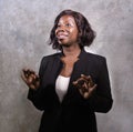 Young beautiful afro American woman coaching at seminar - happy and successful black businesswoman with headset speaking giving Royalty Free Stock Photo