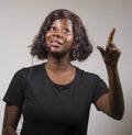 Young beautiful afro American woman coaching at seminar - happy and successful black businesswoman with headset speaking giving Royalty Free Stock Photo