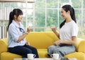 Young and beautiful Asain woman learning hand sign, deaf language from the instructor Royalty Free Stock Photo