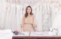 Young beautiful Asian business owner women happy working in wedding boutique showroom , Attractive dressmaker concentrate design Royalty Free Stock Photo