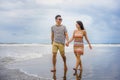 young beautiful Asian Chinese couple walking together on the beach happy in love enjoying holidays and relax smiling joyful in Royalty Free Stock Photo