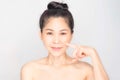 Young beautiful asian girl with clean skin, Cosmetic Beauty Concept,hands touch on the cheek, smiling and friendly face isolated o Royalty Free Stock Photo