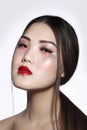 Young beautiful asian girl with fancy glitter makeup Royalty Free Stock Photo