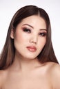 Young beautiful asian girl with smoky eye makeup Royalty Free Stock Photo