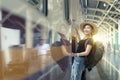 Young beautiful Asian woman backpacker is enjoy traveling by train Royalty Free Stock Photo