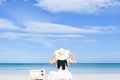 Young beautiful asian woman on the beach,standing running sitting lying with hat white dress swimwear green orange sunglasses sky Royalty Free Stock Photo