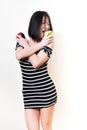 Young beautiful asian woman biting green and red apples Royalty Free Stock Photo