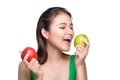 Young beautiful asian woman eating fresh apple isolated on whit Royalty Free Stock Photo