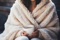 Young beautiful asian woman holding aromatic teacup cup of green leaves tea hot steaming beverage morning comfy Royalty Free Stock Photo