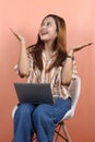 Young beautiful asian woman holding digital tablet