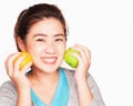 Young beautiful asian woman holding orange and apple,smile Health care concept Royalty Free Stock Photo