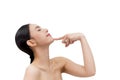 Young beautiful Asian woman pointing at chin in white isolated background Royalty Free Stock Photo