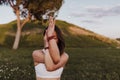 Young beautiful asian woman practicing yoga mindfullness at sunset outdoors. Sports and healthy Lifestyle Royalty Free Stock Photo