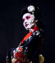 Geisha in kimono on black Royalty Free Stock Photo